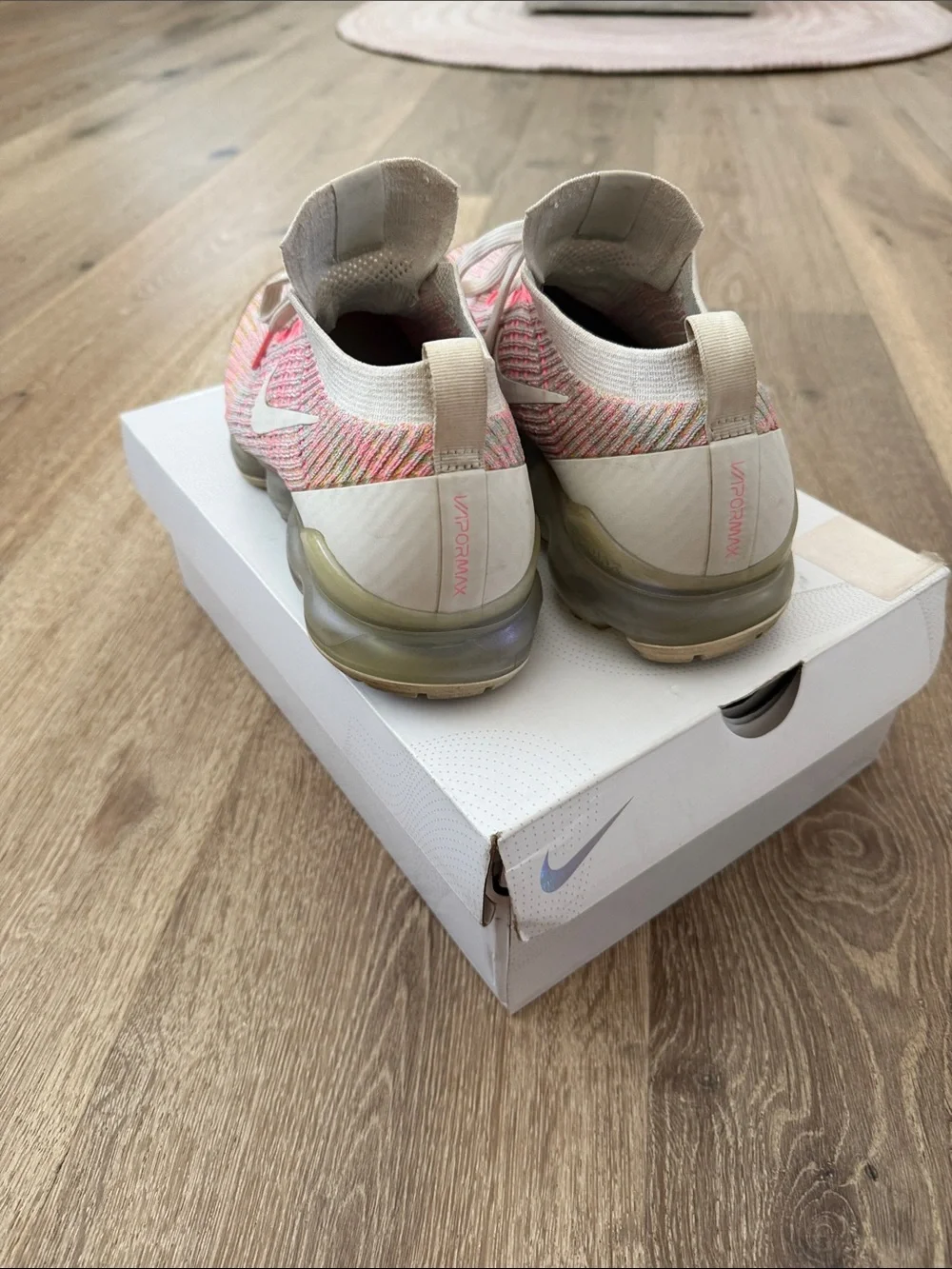 Nike  Pink and Cream Flyknit Sneakers